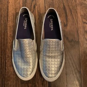 Silver women’s Sperry slip on sneakers